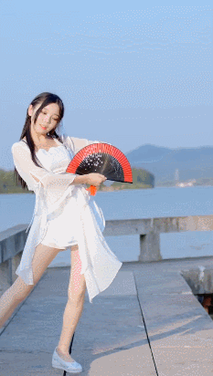 Traditional Fold Fan Dance by Chinese Girl