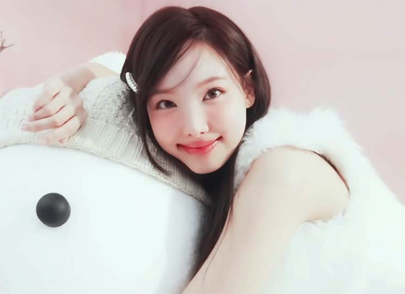 Brunette Hair GIF-Nayeon-with-an-doll.gif